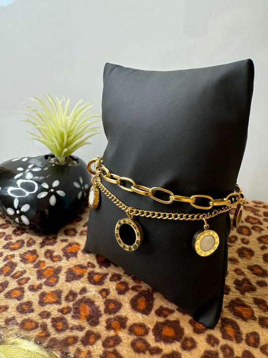 Chain link and charm bracelet